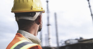 Construction worker looking at the site