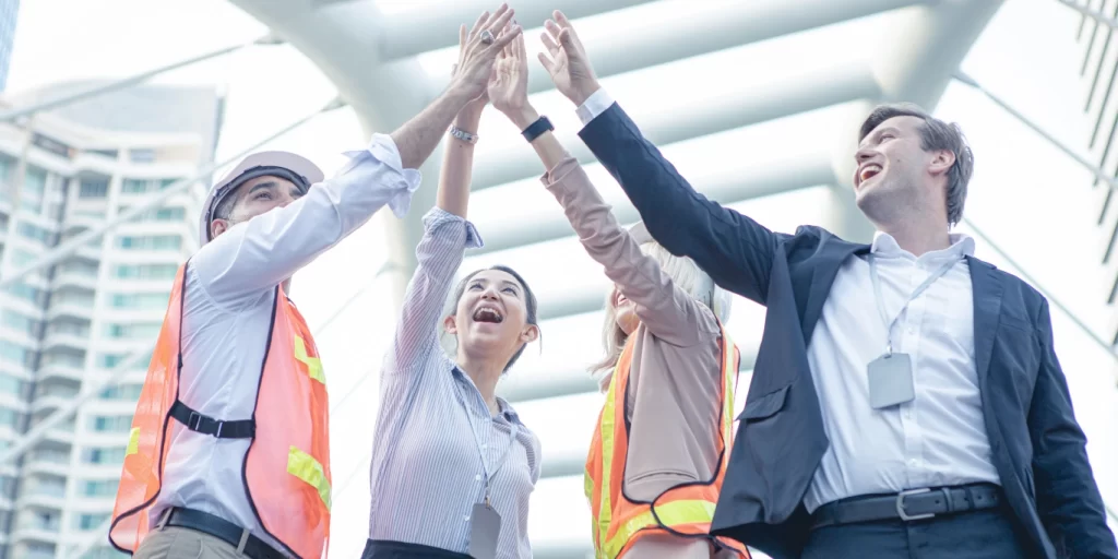 Construction Workers doing High Five